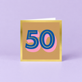 Colourful 50th birthday card with large blue number 50, pink shadow detail, warm gold background and metallic gold foil border.