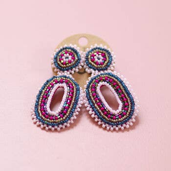 Pink and blue beaded oval statement earrings displayed as a pair on a jewellery card.