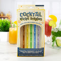 Boxed set of six colourful glass cocktail recipe straws with printed ingredient measurements.
