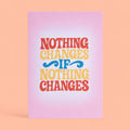 Colourful Nothing Changes If Nothing Changes A5 print with retro red, yellow and blue lettering on a soft pink background.