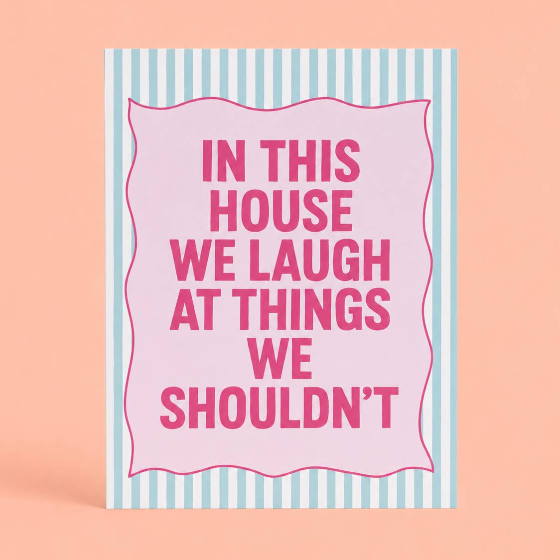 Cheerful pink and mint A5 art print reading “In This House We Laugh At Things We Shouldn’t” with a playful striped border.