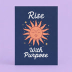 Uplifting Rise With Purpose A5 art print with a warm peach celestial sun and golden stars on a rich navy background.