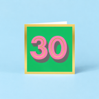 Colourful 30th birthday card with large pink number 30 on a bright green background, finished with a metallic gold foil border.