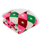 Folded colourful checkerboard throw showing the soft patterned front and fluffy white sherpa reverse.