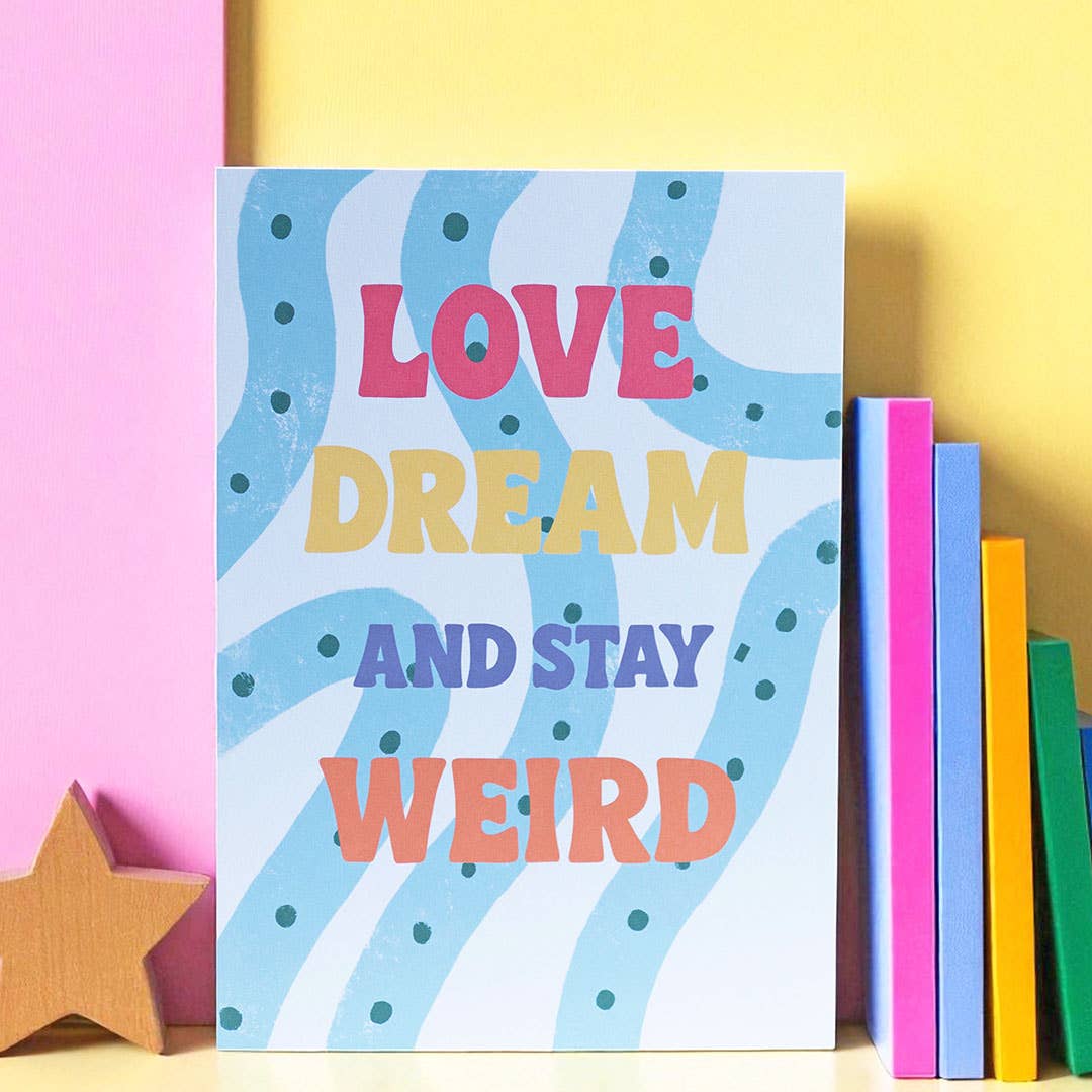Bright Love Dream And Stay Weird A5 print with colourful lettering, wavy blue pattern and playful green dots.