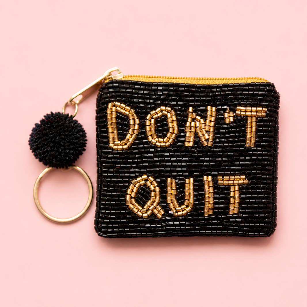 Black beaded mini keyring purse with gold ‘DON’T QUIT’ lettering, black pom pom and gold tone keyring.