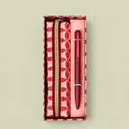 Pink vintage floral vegan leather pencil pouch with gold coloured zip and coordinating pink pen presented together in a gift box.