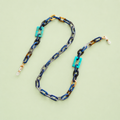 Blue and turquoise statement glasses chain and necklace with navy, grey, tortoiseshell and gold tone links.