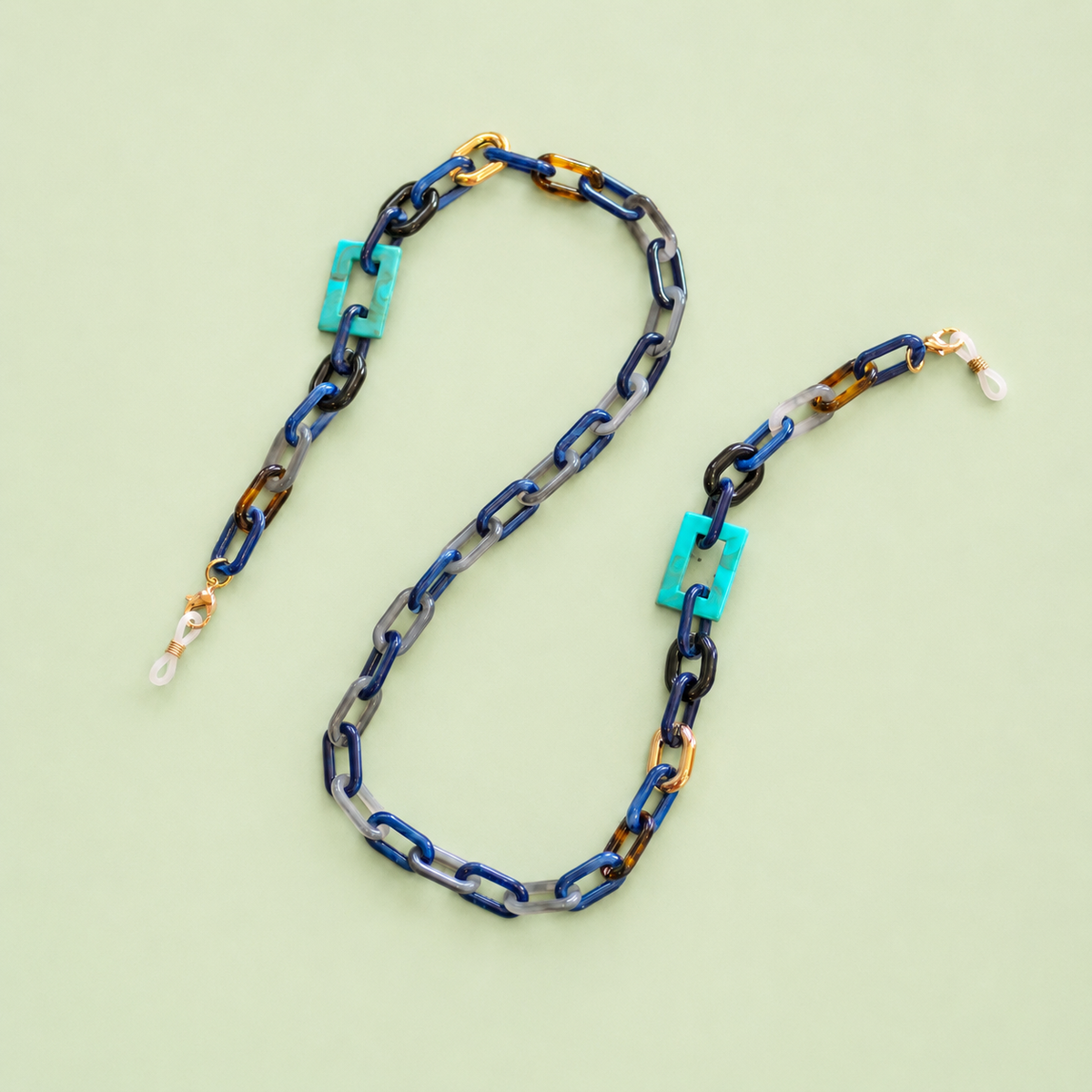 Blue and turquoise statement glasses chain and necklace with navy, grey, tortoiseshell and gold tone links.