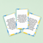 Three Be Happy activity and quote cards displayed on a soft mint green background.