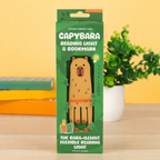 Capybara reading light and bookmark in green Gift Republic packaging.