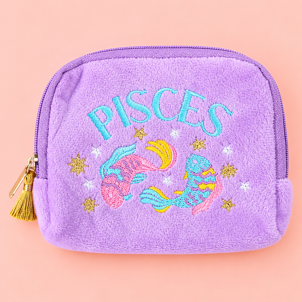 Lilac velvet Pisces zodiac pouch with colourful embroidered fish, stars and gold tassel zip.