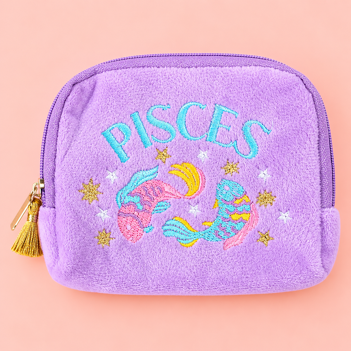 Lilac velvet Pisces zodiac pouch with colourful embroidered fish, stars and gold tassel zip.