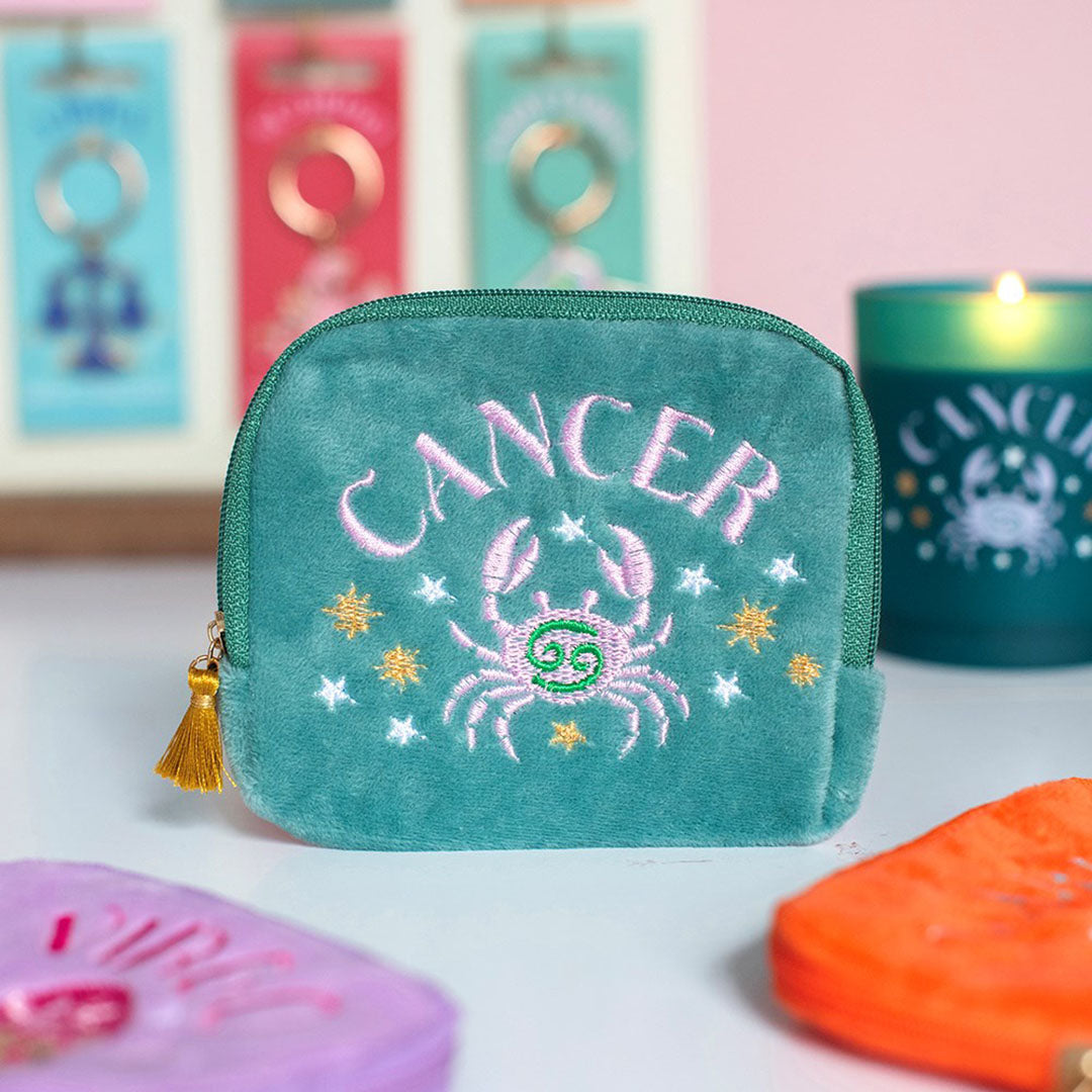 Teal velvet Cancer zodiac pouch with pink embroidered crab, gold and white stars and gold tassel zip.
