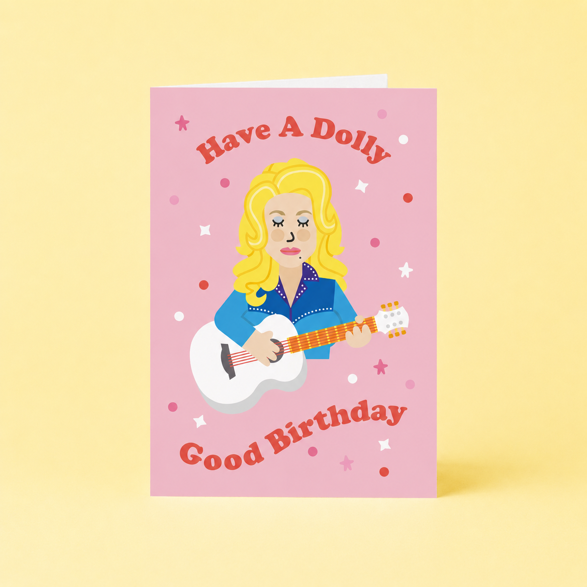 Pink Dolly Parton inspired birthday card featuring a blonde singer with guitar and Have A Dolly Good Birthday message.