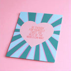 Colourful Be Enough for Yourself A5 print with a pink heart and radiating teal and blue design, displayed on a soft pink background.