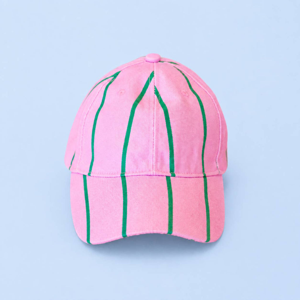 Bright pink baseball cap with playful green stripes, adding an instant splash of colour and fun.
