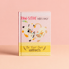 Paw-sitive Vibes Only colourful hardback gift book with illustrated cats and dogs on a pink and yellow cover.