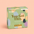 Box of eight You Got This shower steamers scented with ginger, pink grapefruit and sweet orange on a soft peach background.