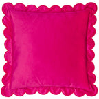 Square hot pink velvet cushion with a soft finish and scalloped border.
