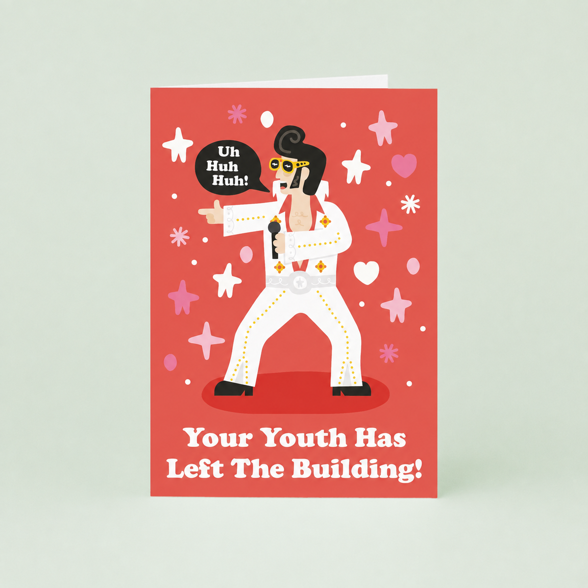 Colourful red birthday card with Elvis inspired illustration and Your Youth Has Left The Building slogan.