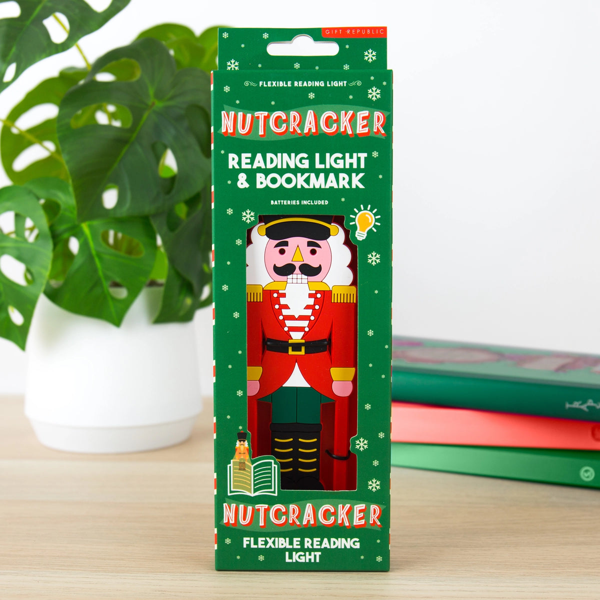Nutcracker flexible reading light and bookmark in green festive packaging with red Nutcracker design.