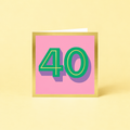 Colourful 40th birthday card with large green number 40, lilac shadow detail, pink background and metallic gold foil border.