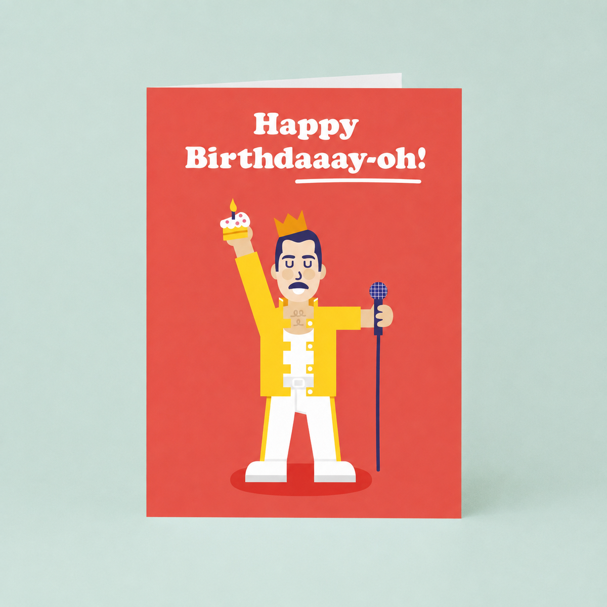 Red Freddie Mercury inspired birthday card featuring a singer in an iconic yellow jacket holding a microphone and birthday cak