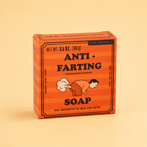 Box of 100g Anti Farting sandalwood scented soap in bright orange retro packaging with funny illustration on a pale yellow background.