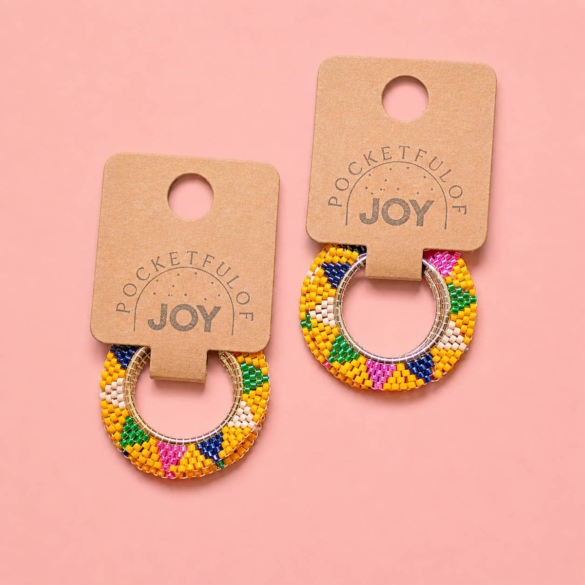 Yellow multicolour beaded hoop earrings displayed on Pocketful of JOY jewellery cards.