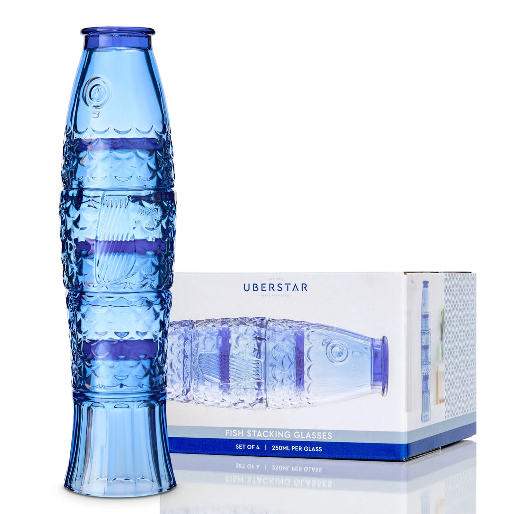 Blue fish stacking glass set with four tumblers stacked into a fish beside its presentation box.