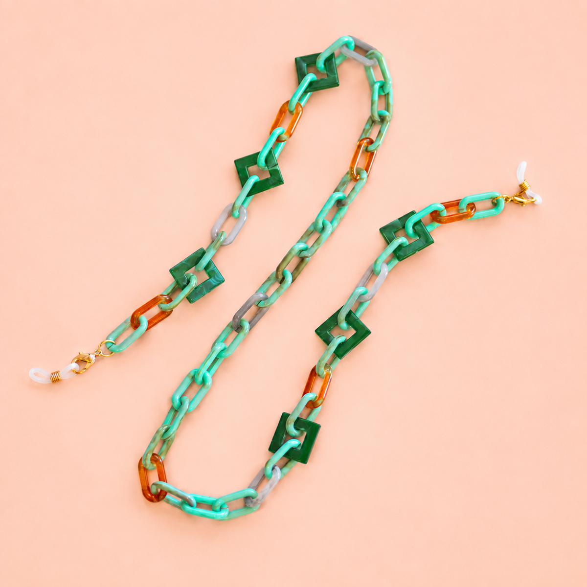 Green and turquoise statement glasses chain and necklace with mint, amber, grey and dark green geometric links.