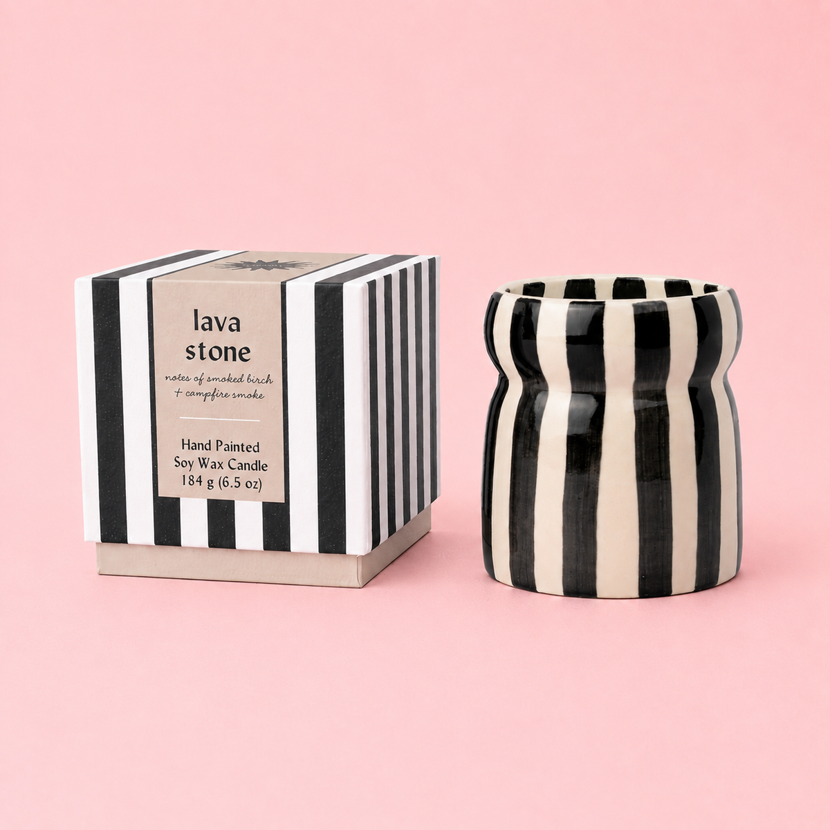 Cabana striped ceramic scented candle with colourful hand painted design.