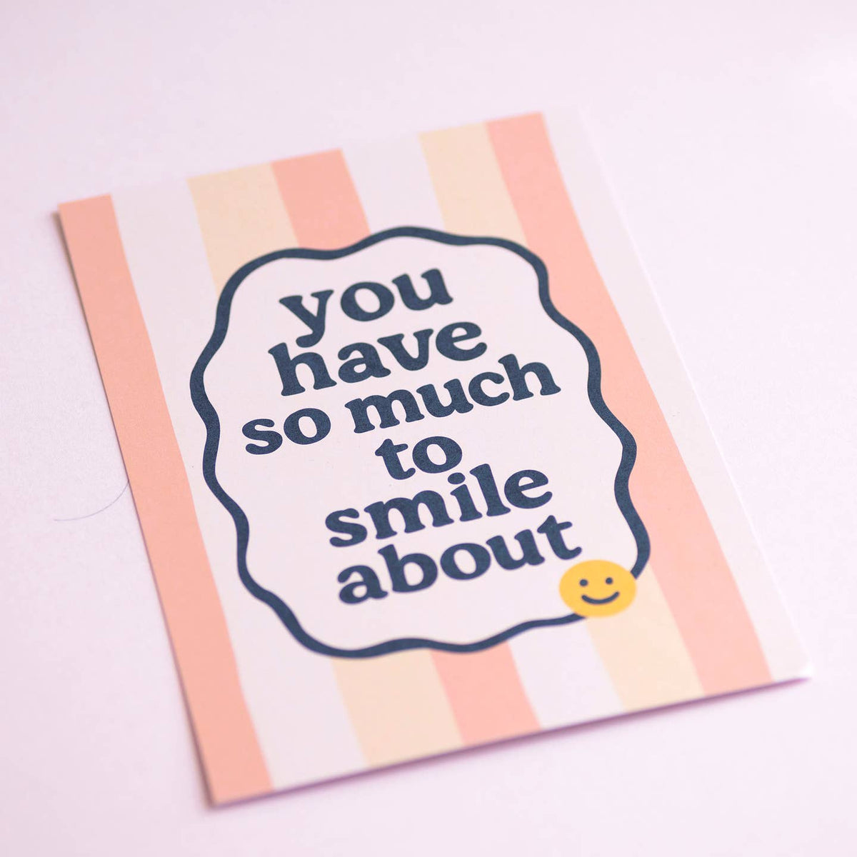 Uplifting striped A5 art print with the words “You Have So Much To Smile About” and a playful yellow smiley detail.
